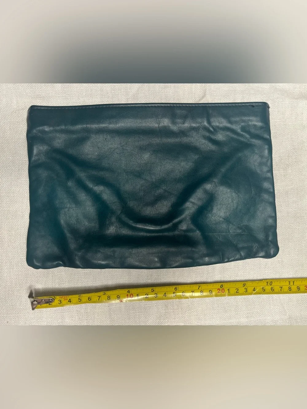 Vintage teal colored leather clutch